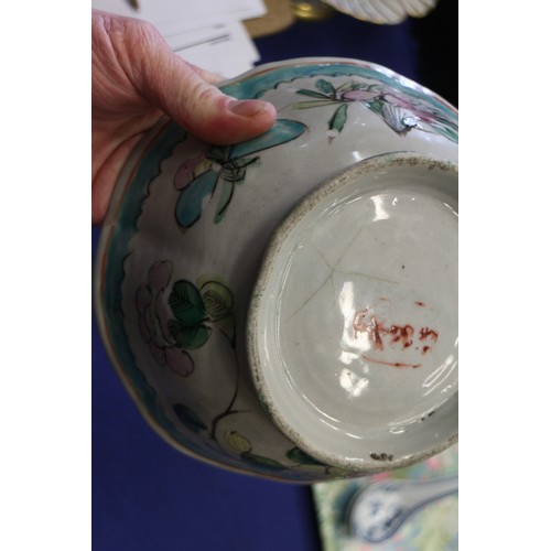 102 - A Chinese shaped Imari plate with mythical beast decoration, 8 1/4