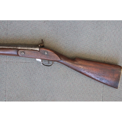 190 - A percussion cap musket with hardwood stock patched in copper, 42 3/4