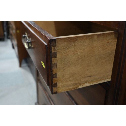 485 - A Victorian walnut chest of two short and three graduated drawers with pierced brass handles, on blo... 