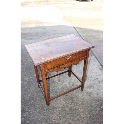 466 - An antique oak elm and walnut side table, fitted one drawer, on chamfered and stretchered supports, ... 