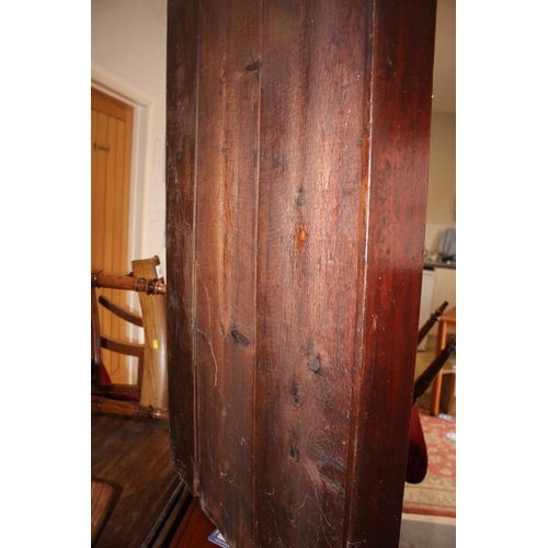 472 - A late 19th century mahogany corner hanging cupboard enclosed two panelled doors, 36