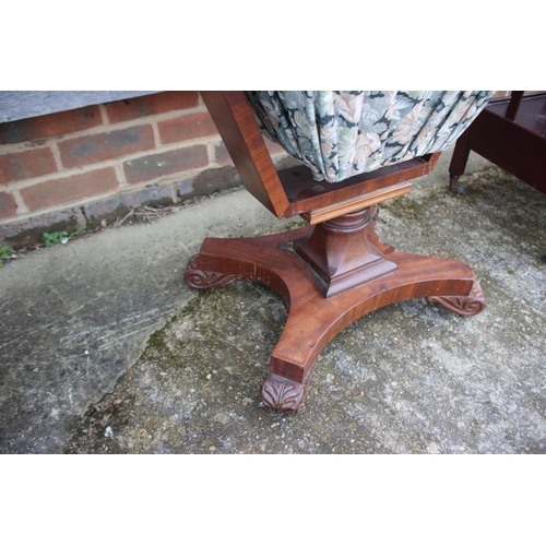 492 - A 19th century mahogany work table, fitted two drawers and well, on shaped support and quatreform ba... 