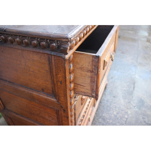 493 - A largely early 18th century oak chest of two short and two long drawers, on bun feet, 43