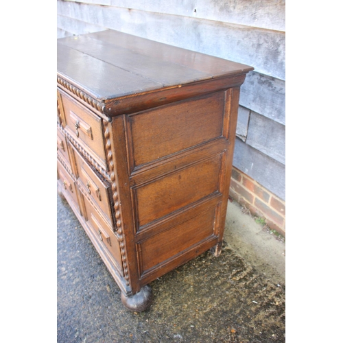 493 - A largely early 18th century oak chest of two short and two long drawers, on bun feet, 43