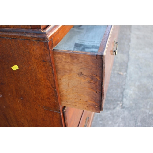 499 - A 19th century mahogany chest on chest of two short drawers and six graduated long drawers, on brack... 