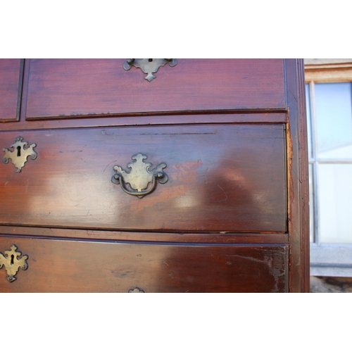 499 - A 19th century mahogany chest on chest of two short drawers and six graduated long drawers, on brack... 