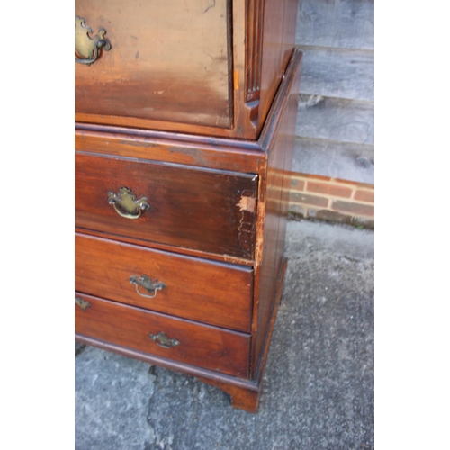 499 - A 19th century mahogany chest on chest of two short drawers and six graduated long drawers, on brack... 