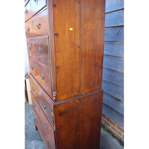 499 - A 19th century mahogany chest on chest of two short drawers and six graduated long drawers, on brack... 