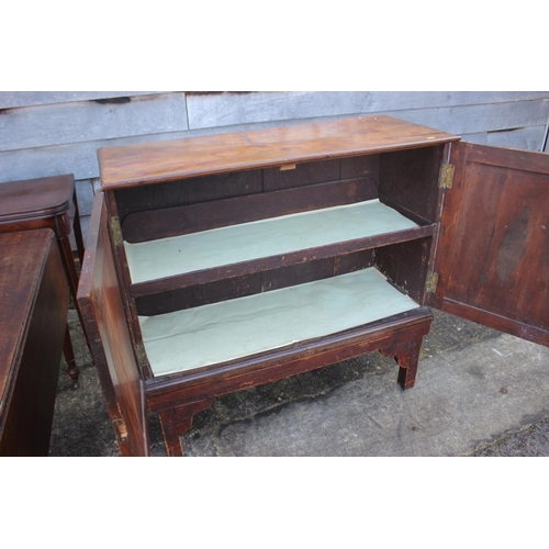 461 - A 19th century fruitwood cupboard enclosed two doors, on later stand, 41