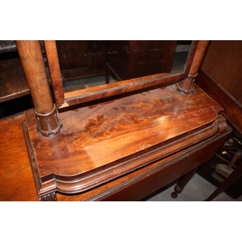 521 - A Victorian figured mahogany toilet mirror, on break bowfront plateau base, on scroll supports, 26 1... 