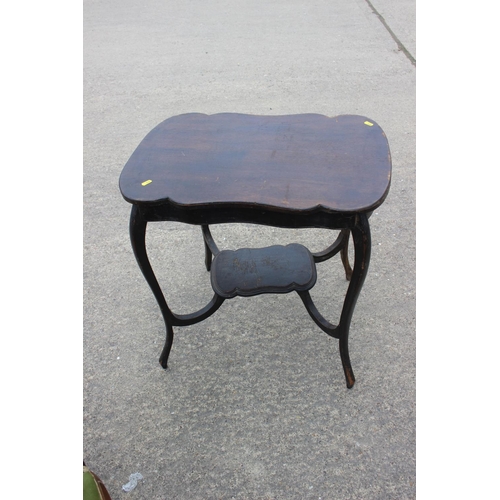 545 - An early 20th century mahogany shape top two-tier occasional table, on cabriole supports, 25