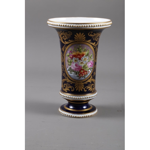 1 - An early 19th century flared rim vase with panelled floral decoration and gilt highlights, 9 1/2