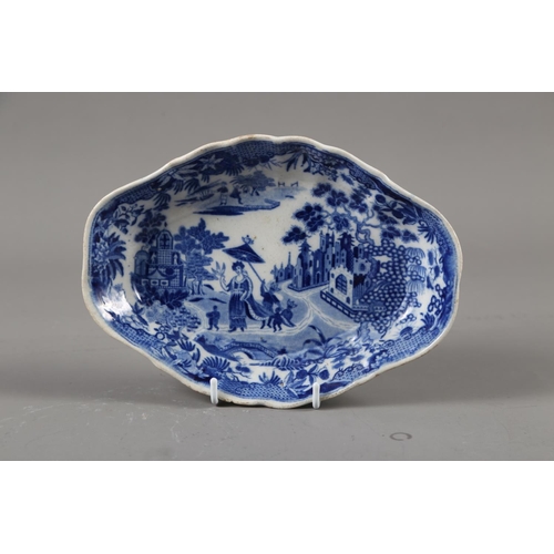 11 - A 19th century blue and white pearlware shaped dish with chinoiserie decoration, 8