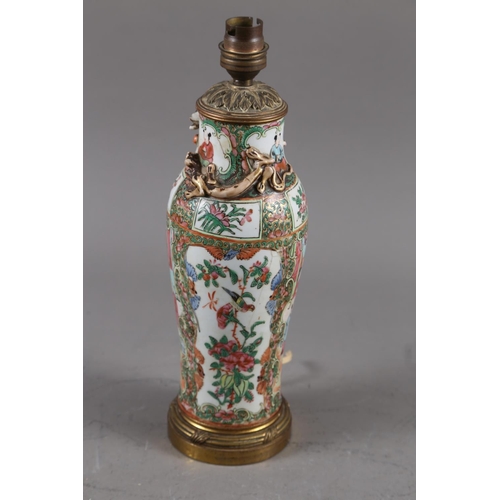 112 - A Canton baluster vase with figure, bird and flower decoration, 12