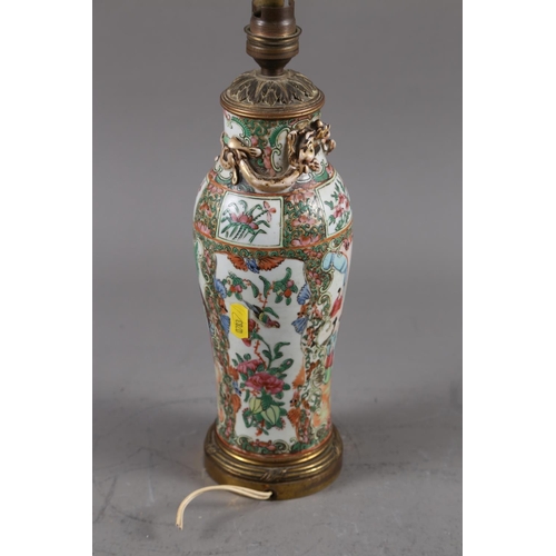 112 - A Canton baluster vase with figure, bird and flower decoration, 12