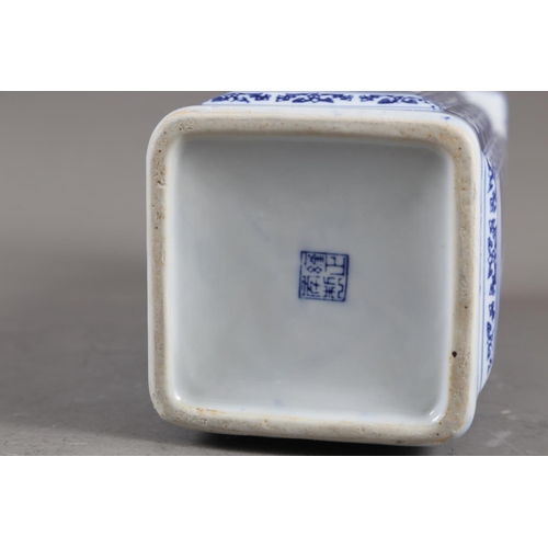 114 - A pair of Chinese blue and white square landscape decorated jars with seal marks to base, on stands,... 