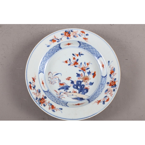 117 - A Chinese porcelain scroll decorated plate, 9