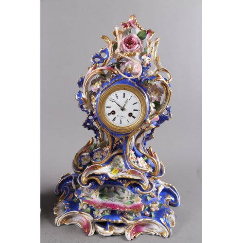 136 - Two 19th century Continental porcelain cased mantel clocks with floral relief decoration, on stands,... 