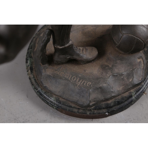 146 - 20th century Lemoyne: a spelter footballer figure, on circular marble base with plaque 