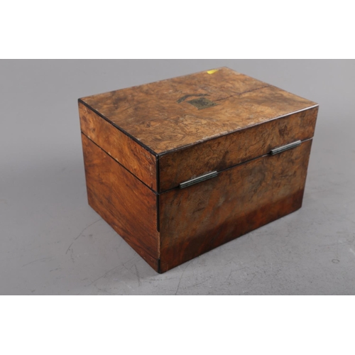 160 - A 19th century figured walnut brass inlaid jewellery box, the fitted interior with mirror, faux fron... 