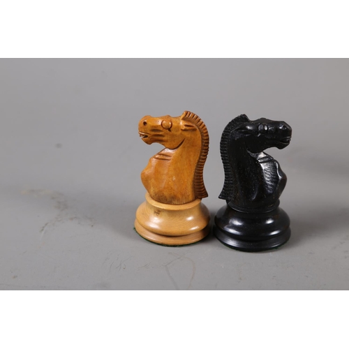 182 - A turned boxwood and ebony chess set, king 4