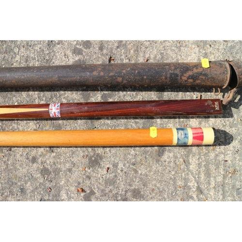 188 - Two billiard cues, one in japanned case