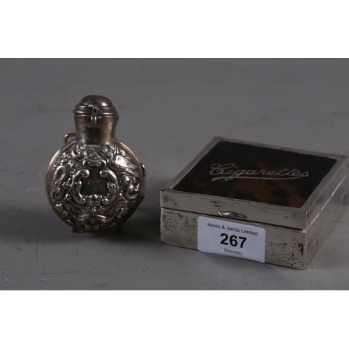 267 - An embossed silver scent bottle case and a silver and tortoiseshell cigarette box