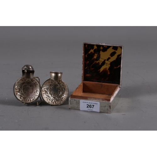 267 - An embossed silver scent bottle case and a silver and tortoiseshell cigarette box