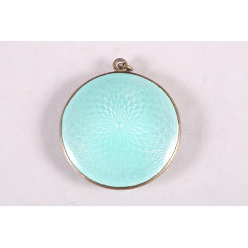 291 - A light green guilloche enamel compact, a hexagonal silver pill box with engraved decoration and a w... 