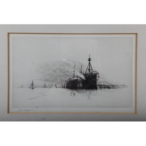 357 - Harold Wylie: an etching, two ships at a dock, in Hogarth frame