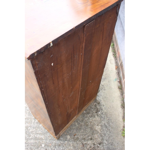 438 - A late 19th century figured walnut and inlaid music cabinet enclosed glazed door, on block base, 20