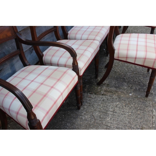 447 - A set of eight early 19th century bar back dining chairs with stuffed over seats, on turned supports... 