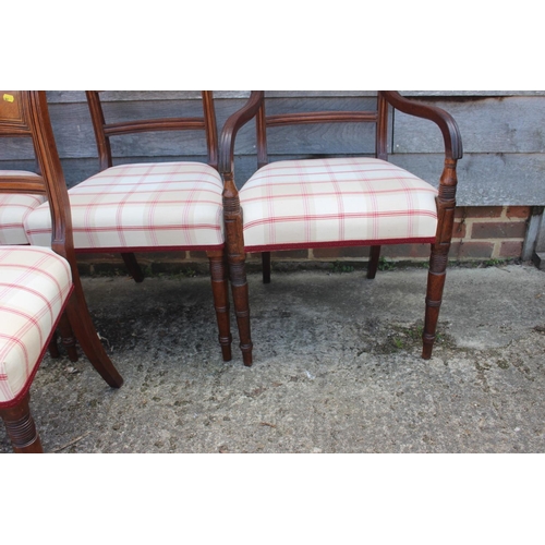 447 - A set of eight early 19th century bar back dining chairs with stuffed over seats, on turned supports... 