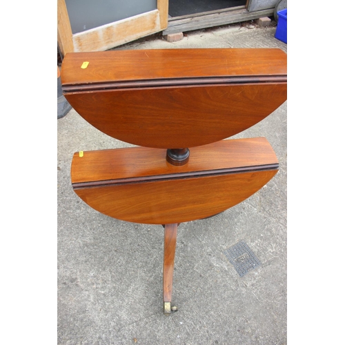 451 - A 19th century mahogany two-tier flap top dumb waiter, on turned column and tripod splay support wit... 