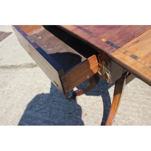 456 - A Regency mahogany and zebrano banded sofa table, fitted one drawer, on square column and quadruple ... 