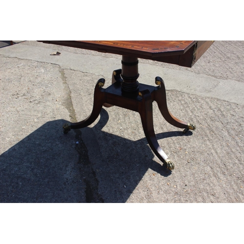 456 - A Regency mahogany and zebrano banded sofa table, fitted one drawer, on square column and quadruple ... 