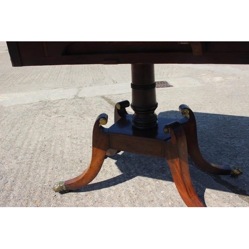 456 - A Regency mahogany and zebrano banded sofa table, fitted one drawer, on square column and quadruple ... 