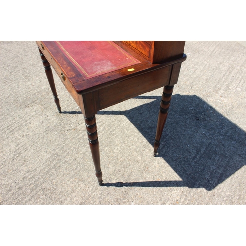 457 - A Sheraton Revival mahogany bonheur du jour with brass gallery top over nest of drawers, pull-out wr... 