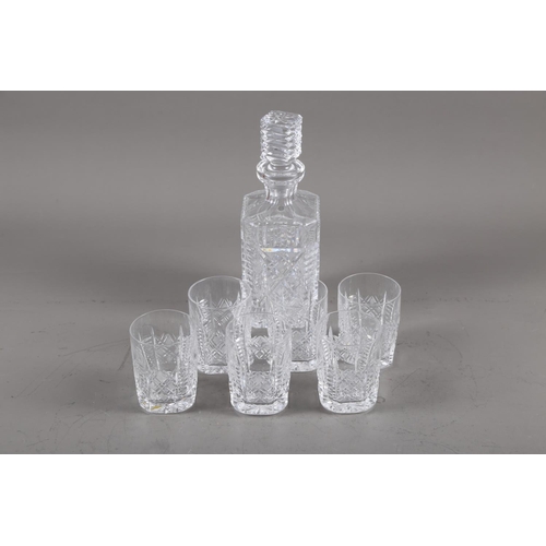46 - A Waterford spirit decanter and six matching tumblers