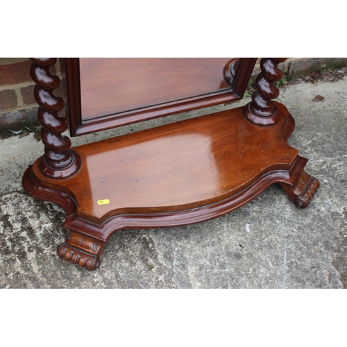 464 - A 19th century mahogany swingframe toilet mirror with spiral column, on serpentine base and scroll f... 