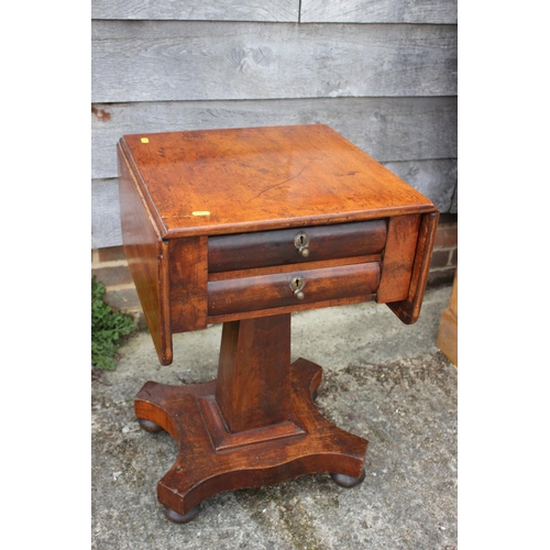 468 - A 19th century mahogany work table, fitted flap top and two drawers, on quatraform base, 34