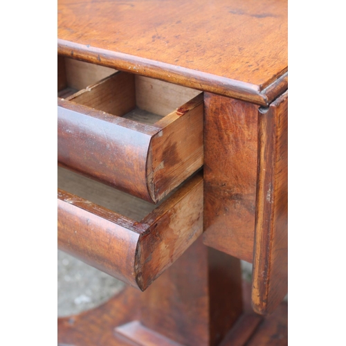 468 - A 19th century mahogany work table, fitted flap top and two drawers, on quatraform base, 34