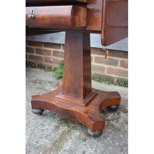 468 - A 19th century mahogany work table, fitted flap top and two drawers, on quatraform base, 34