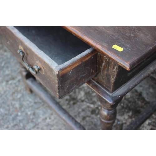 500 - An early 19th century oak side table, fitted one drawer, on turned and stretchered supports, 31