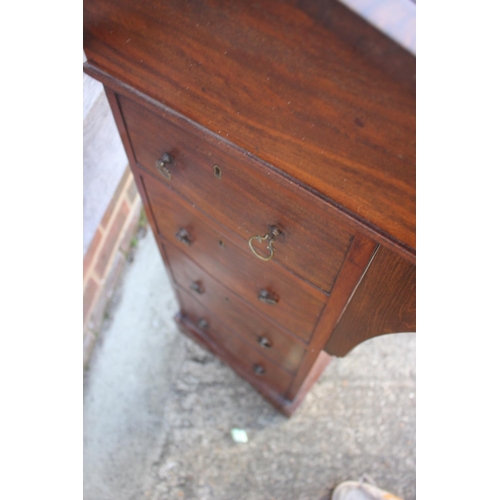 503 - A late 19th century walnut Davenport type desk, with raised back over writing slope, pull-out pen dr... 