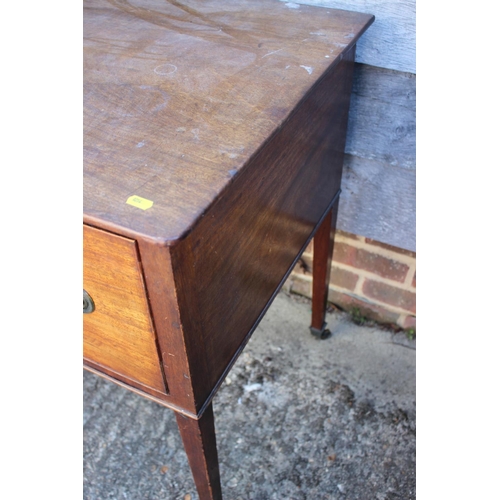 504 - A 19th century mahogany lowboy, fitted two deep and one shallow drawer, on square taper castored sup... 