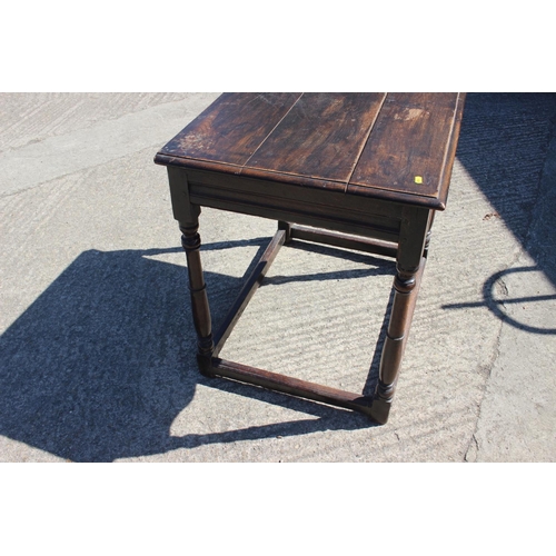 507 - An early 18th century oak low side table, fitted one drawer, on turned supports, 27 1/2