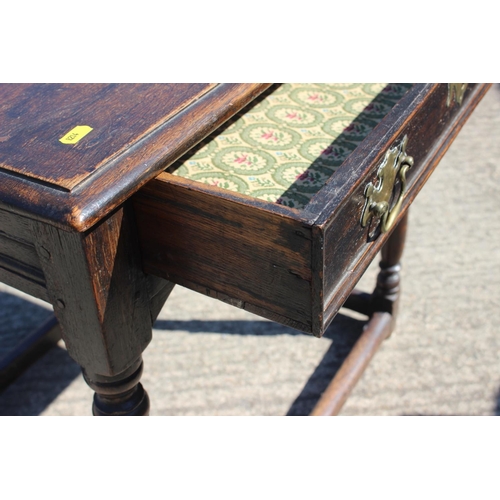 507 - An early 18th century oak low side table, fitted one drawer, on turned supports, 27 1/2