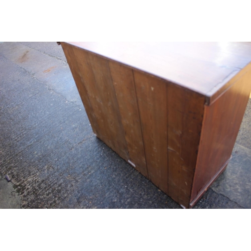 511 - A late 19th century mahogany chest of two short and two long graduated, on bun feet, 39 1/2