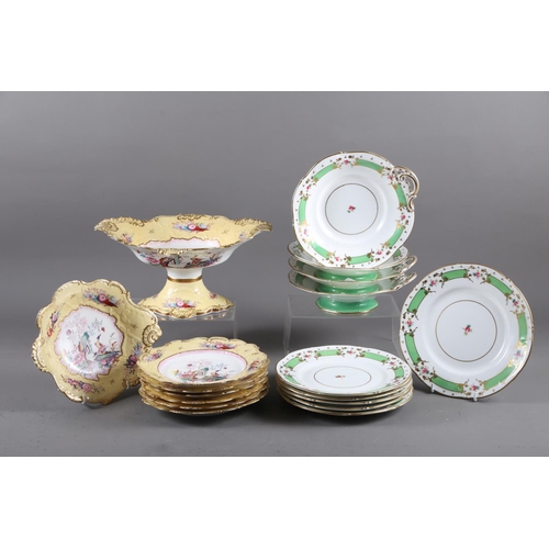 52 - An English mid 19th century dessert service with birds in a landscape decoration and yellow and gilt... 
